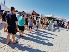 vendor lines and tents at sand sculpting championship