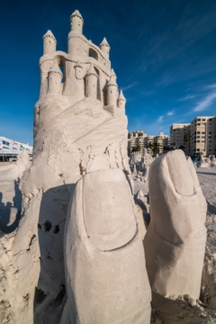 holding up the castle sand sculpture